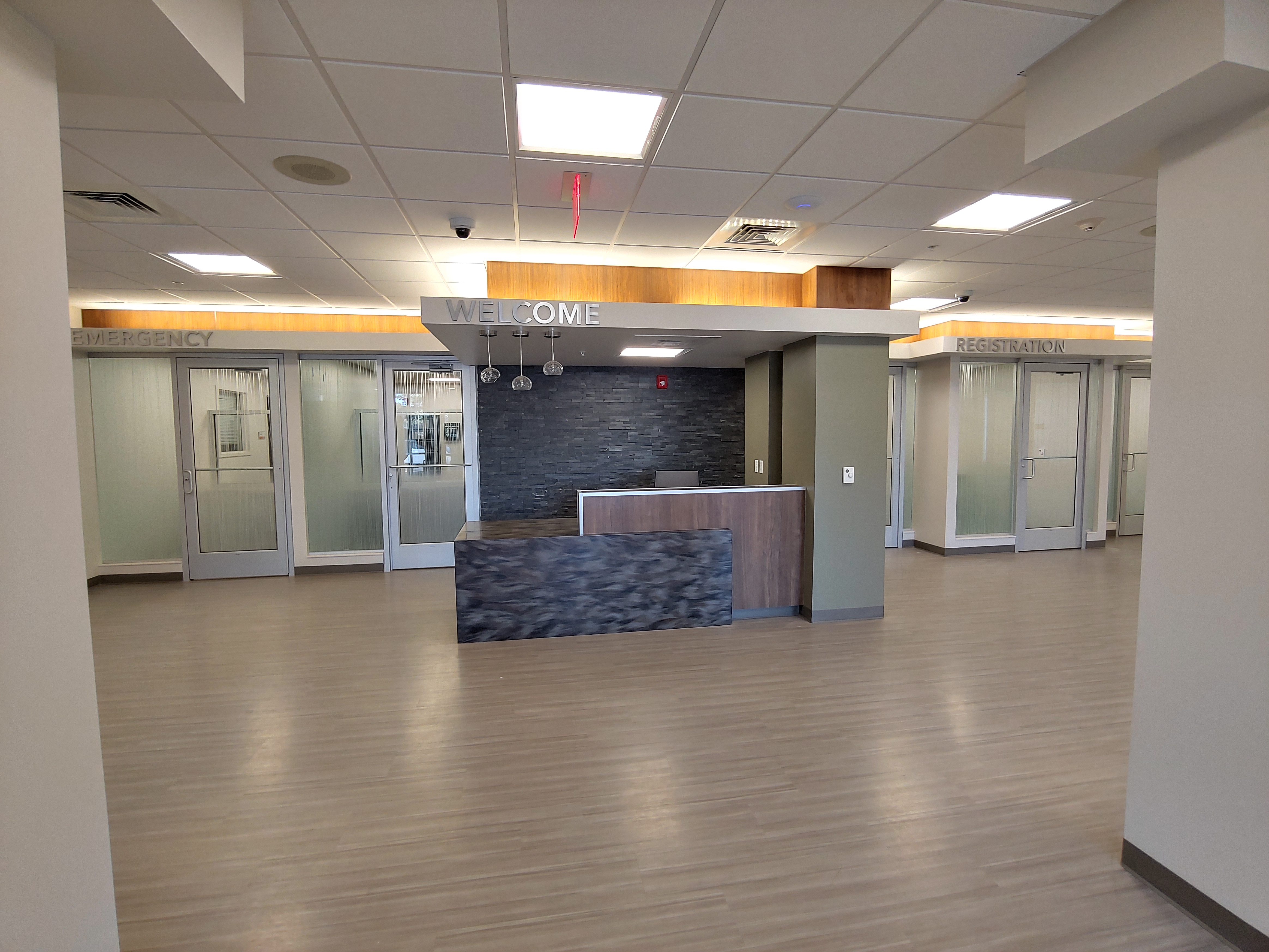 A photo of the admissions desk in the entrance of the main hospital