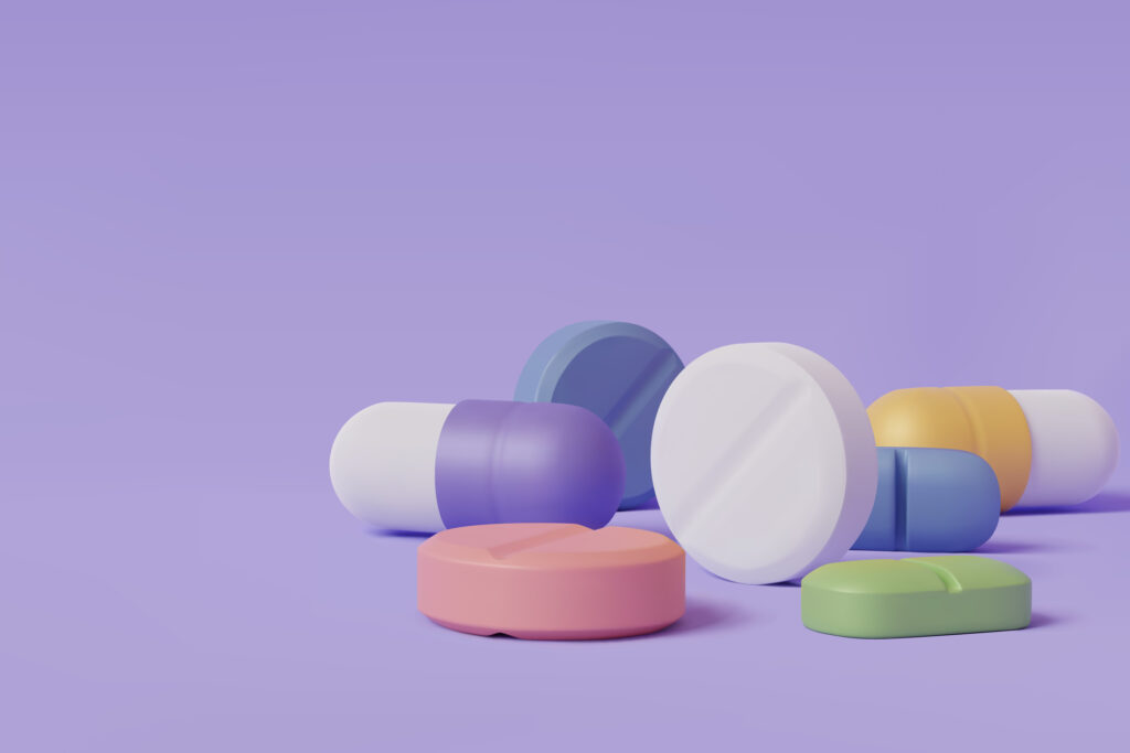 A close-up rendering of various medicines on a purple background