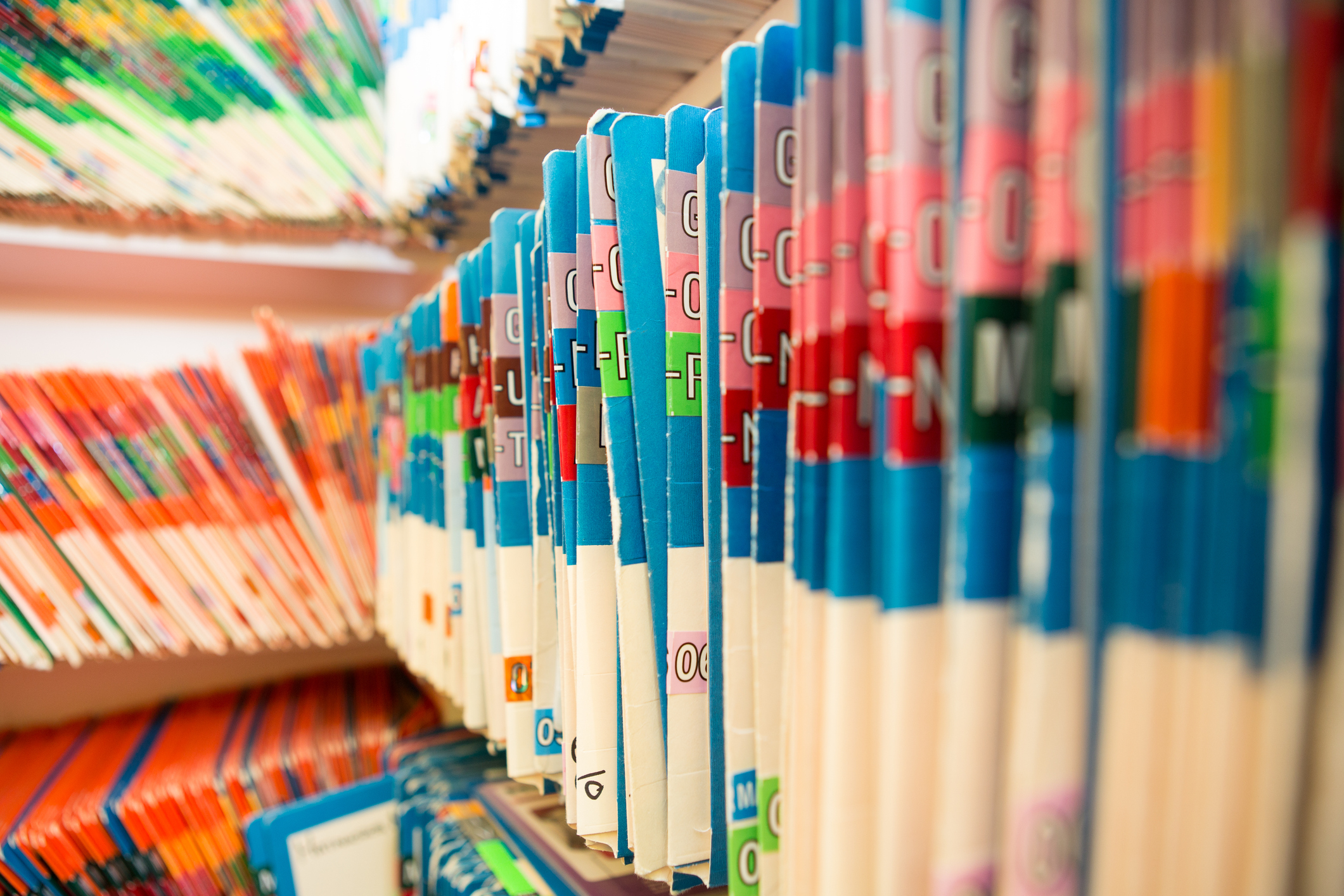 Shallow focus photo of a patient charts with focus on the middle