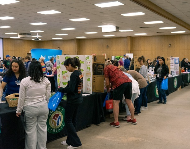 A photo of members of the general public attending the health fair.