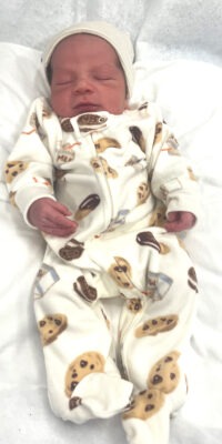 A photograph of a newborn baby