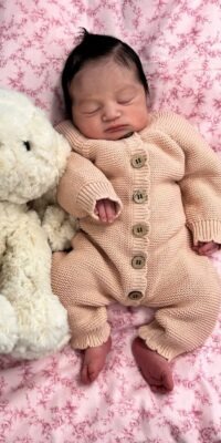 A photograph of a newborn baby