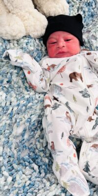 A photograph of a newborn baby