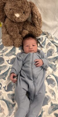 A photograph of a newborn baby
