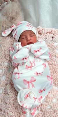 A photograph of a newborn baby